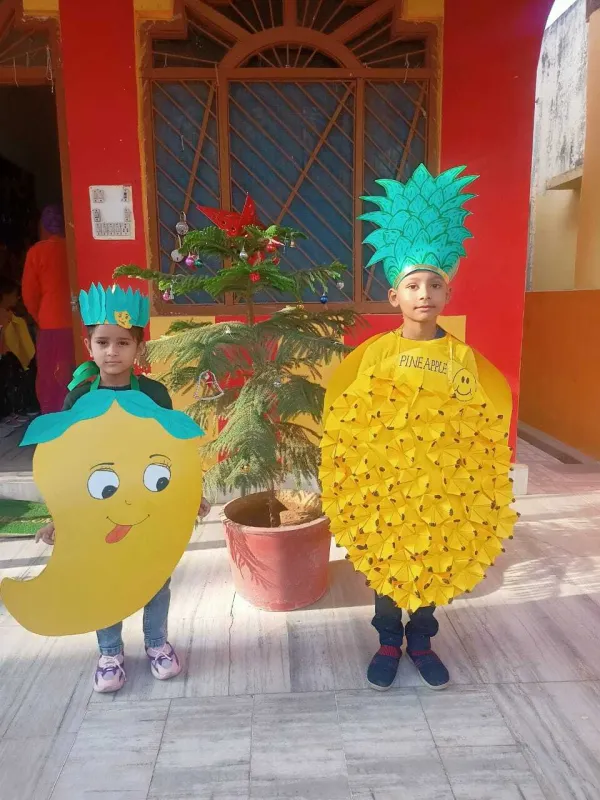 A mango and a pineapple ready for Fruit Day